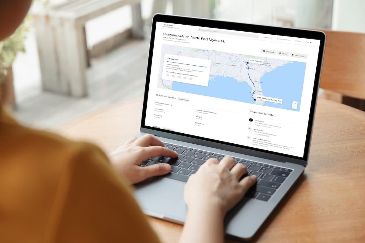Uber Freight system showing status of a shipment on a laptop