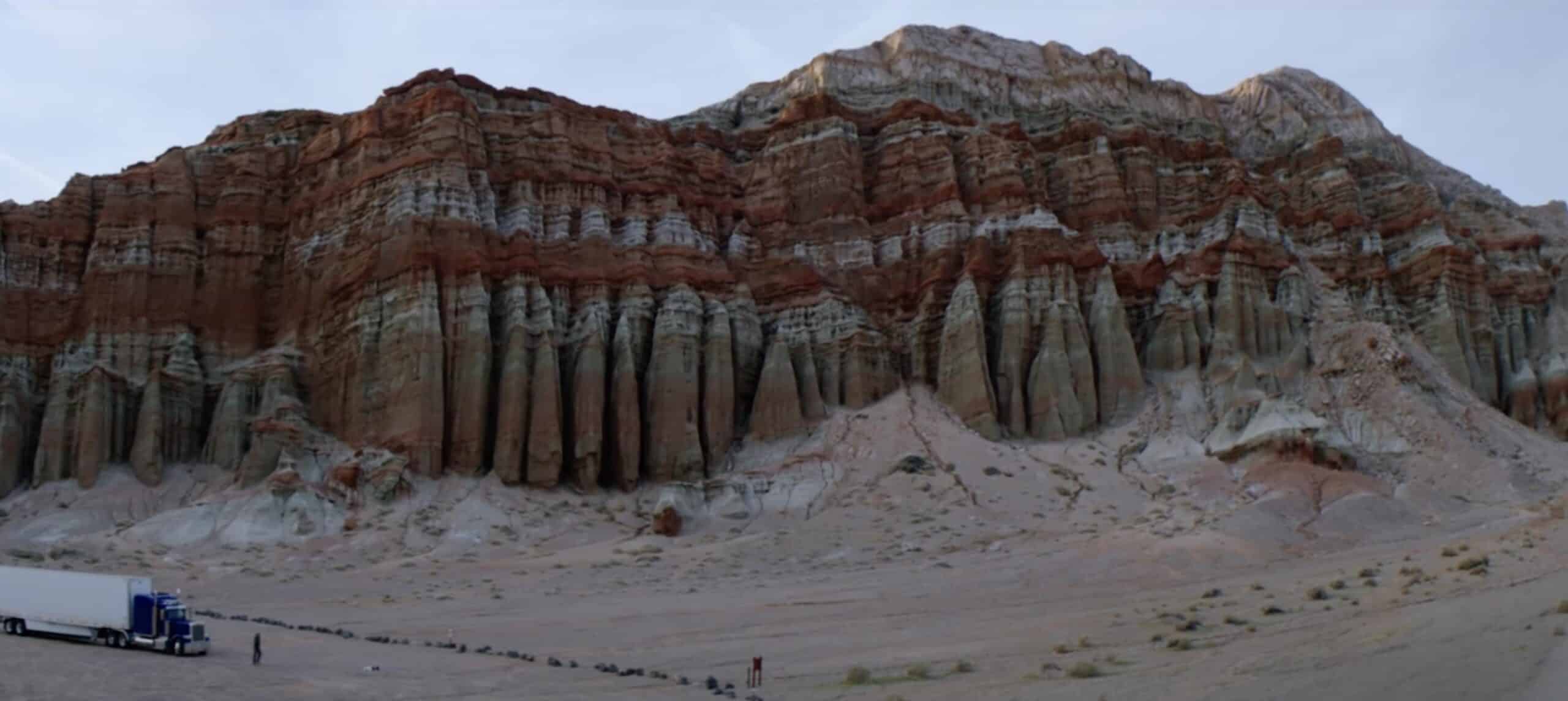 rock cliff and semi