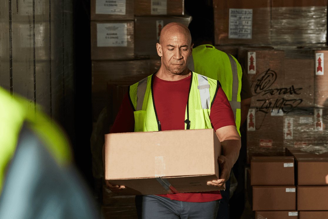 man carrying box