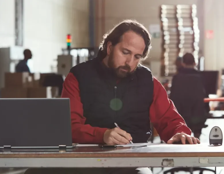 man working at desk